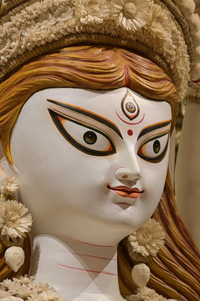 Detailed close-up of a traditional Durga idol showcased during Durga Puja in Kolkata, India.